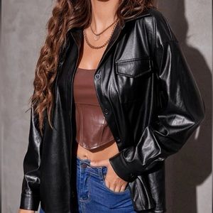 Oversized Faux leather button down shirt in black. Never worn! XL
